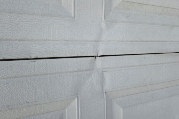 cracked garage door section repair Las Vegas