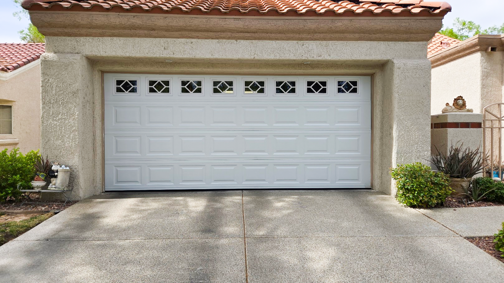 White residential garage door with windows at a Las Vegas home